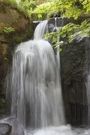 summer landscape with beautiful waterfall