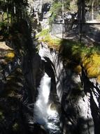 waterfall on a rocky mountain with white water