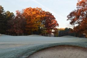 golf course red orange autumn landscape