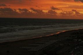 dramatic yellowish sea sunset