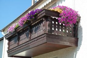 decorated by flowers wooden balcony