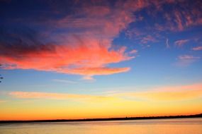 Orange clouds on the sky during the dawn