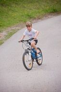 child girl cycling on bike