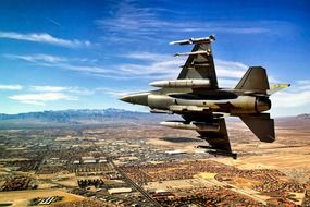 military fighter flies over Las Vegas