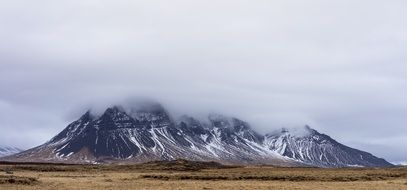 snowy mountain clouds landscape