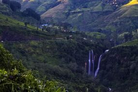 water falling from a mountain