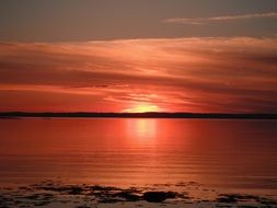 red sunset over the river of St. Lawrence