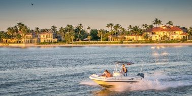 speeding boat on the tropical coast