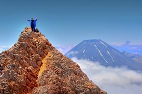 man on top of ruapehu volcano