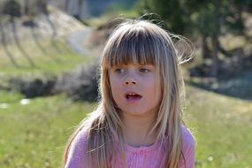 outdoor portrait of a girl child with long hair
