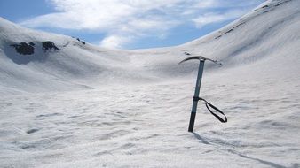 rock hammer on top of alpine mountain