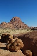 remote view of the spitzkoppe mountains in the namibian desert