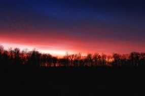 red sunset in the dark evening sky