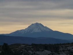 a distant view of the beautiful Hasan volcano among the plants in Turkey