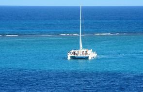 caribbean sea and sailing vessel sunny scene