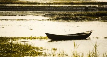 boat on the water in the rain