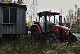 red tractor in the forest