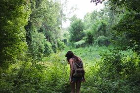 young girl in forest