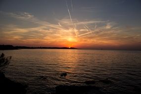 distant view of the sunset over the island