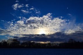 sunlight through thick clouds