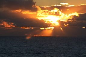stunning cloudy sunset at sea