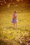 girl with toy teddy