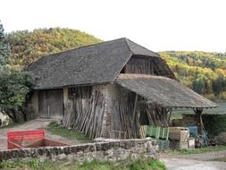 old barn near the autumn forest