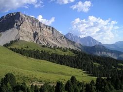distant view of sassolungo mountain in south tyrol