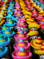 colorful cactuses with hats
