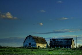 buildings on a green field