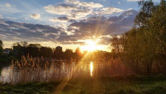 scenery evening sun rays at lake
