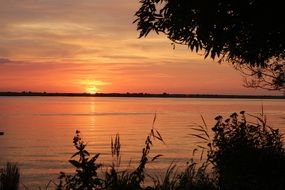 sunset on the horizon of the river in poland