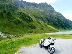 parked motorcycle on the background of the Silvretta mountain range