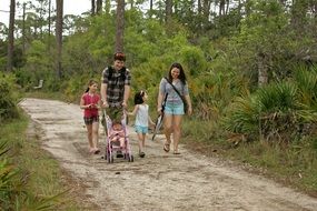 family walking by nature
