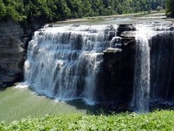 natural waterfall in park summer scene