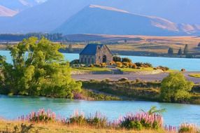 landscape view of amazing church on lake tekapo in new zealand