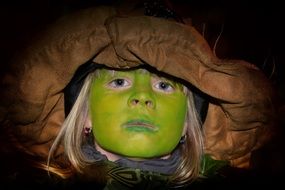 green face of girl for festival