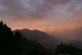 foggy sunset over the mountains in Austria