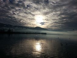 clouds over the lake at dusk