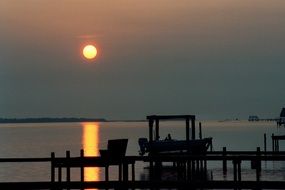 sun reflection at sunset in the ocean