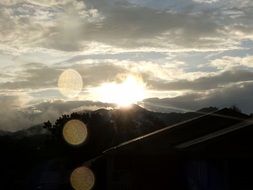 bright cloudy sunset in the mountains