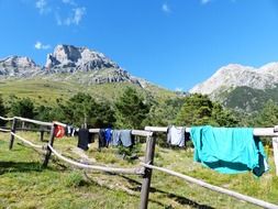 clothes dryer on a wooden fence