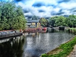 canal with floating houses in England