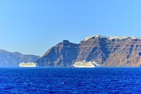 cruise ships near scenic coast, greece, santorini