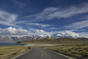 landscape of winding road to mountains