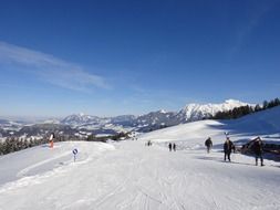 tourists on the snow slope