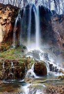 beautiful rock waterfall with plants in Virginia on landscape