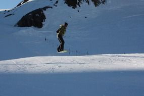 a lonely snowboarder on the freeride