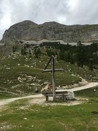 cross on a background of mountains in South Tyrol