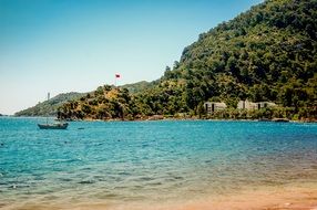 the beach, the mountains, the bay on a sunny day